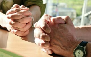 Image of praying hands.