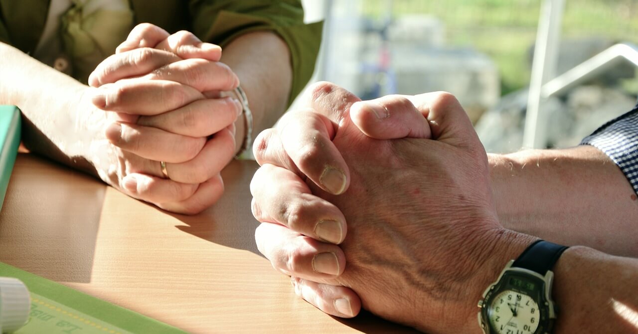 Image of praying hands.